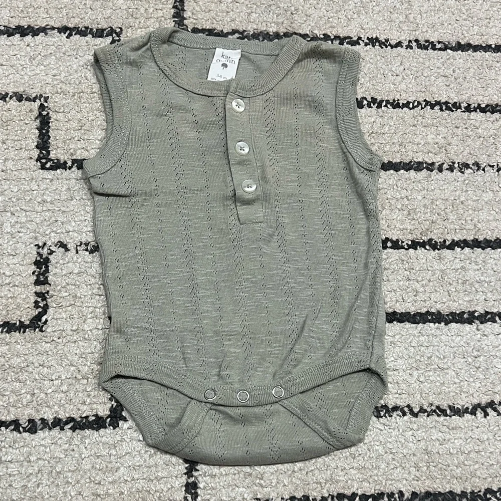 Kate Quinn Sleeveless Sage Green Baby Onesie